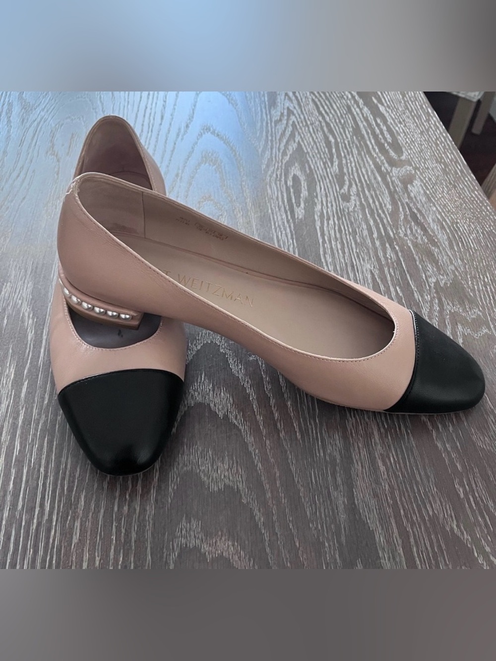 Stuart Weitzman Nude and Black Leather Cap-Toe Flats & Pearl heels.